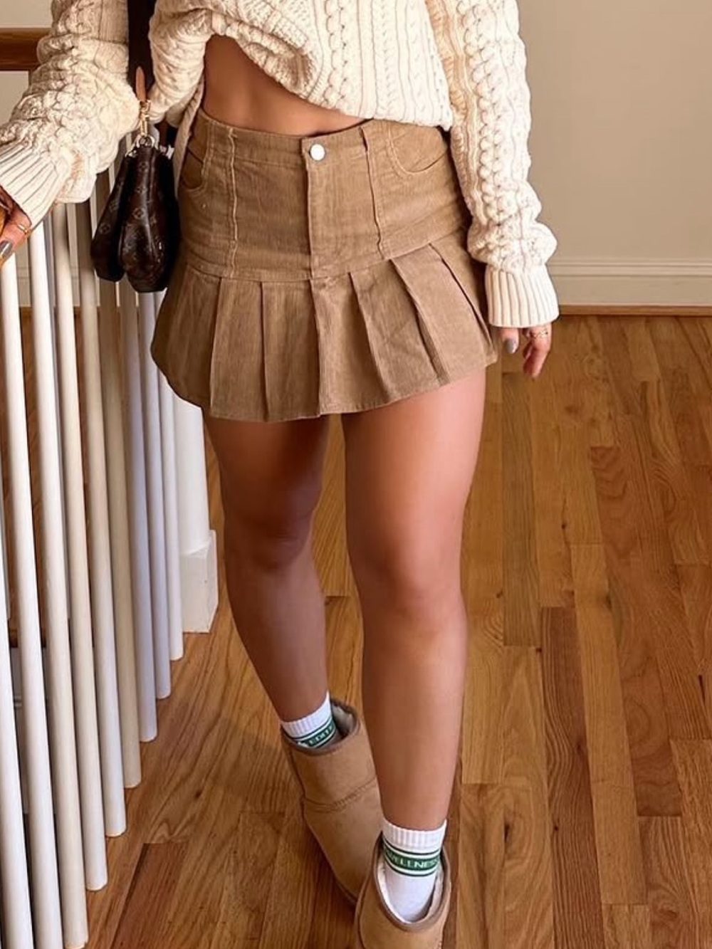 Chloe Pleated Hem Mini Skirt in Nude